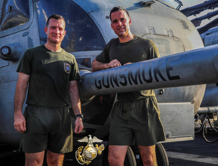 May 13, 2016 - U.S. Marines Lt. Col. Jonathan R. Smith (left), the ground combat element commander with the 13th Marine Expeditionary Unit, and Maj. Michael F. Smith, air combat element operations officer with the 13th MEU, stand side-by-side next to the CH-53E detachment flagship, 'Gunsmoke' helicopter, fuel probe aboard the USS Boxer (LHD 4). The flagship is named after the 13th MEU's Battalion Landing Team, which is commanded by Jonathan, and piloted by Michael. (Image created by USA Patriotism! from U.S. Marine Corps photo by Cpl. Alvin Pujols) 