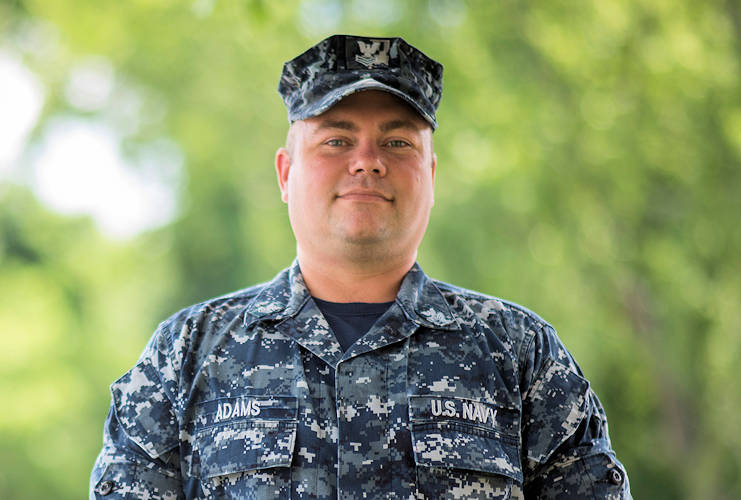 July 12, 2017 - Navy Counselor 1st Class Charles "Greg" Adams outside of Navy Recruiting District Nashville Headquarters, where he serves after rejoining the Navy. (U.S. Navy photo by Petty Officer 1st Class Timothy Walter)