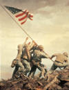 Marines raising flag at Iwo Jima in WWII