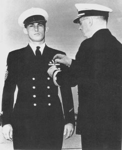 Ray Evans receiving his Navy Cross Medal for action seen at Point Cruz. Evans had already received a battlefield advancement and later received an officer’s commission. Coast Guard Collection.